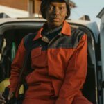Alomo Cleaning professional in red work overalls, Laurel MD